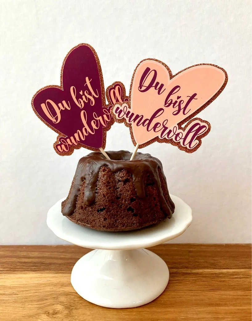 Herzförmiger Cake Topper mit Aufschrift du bist wundervoll