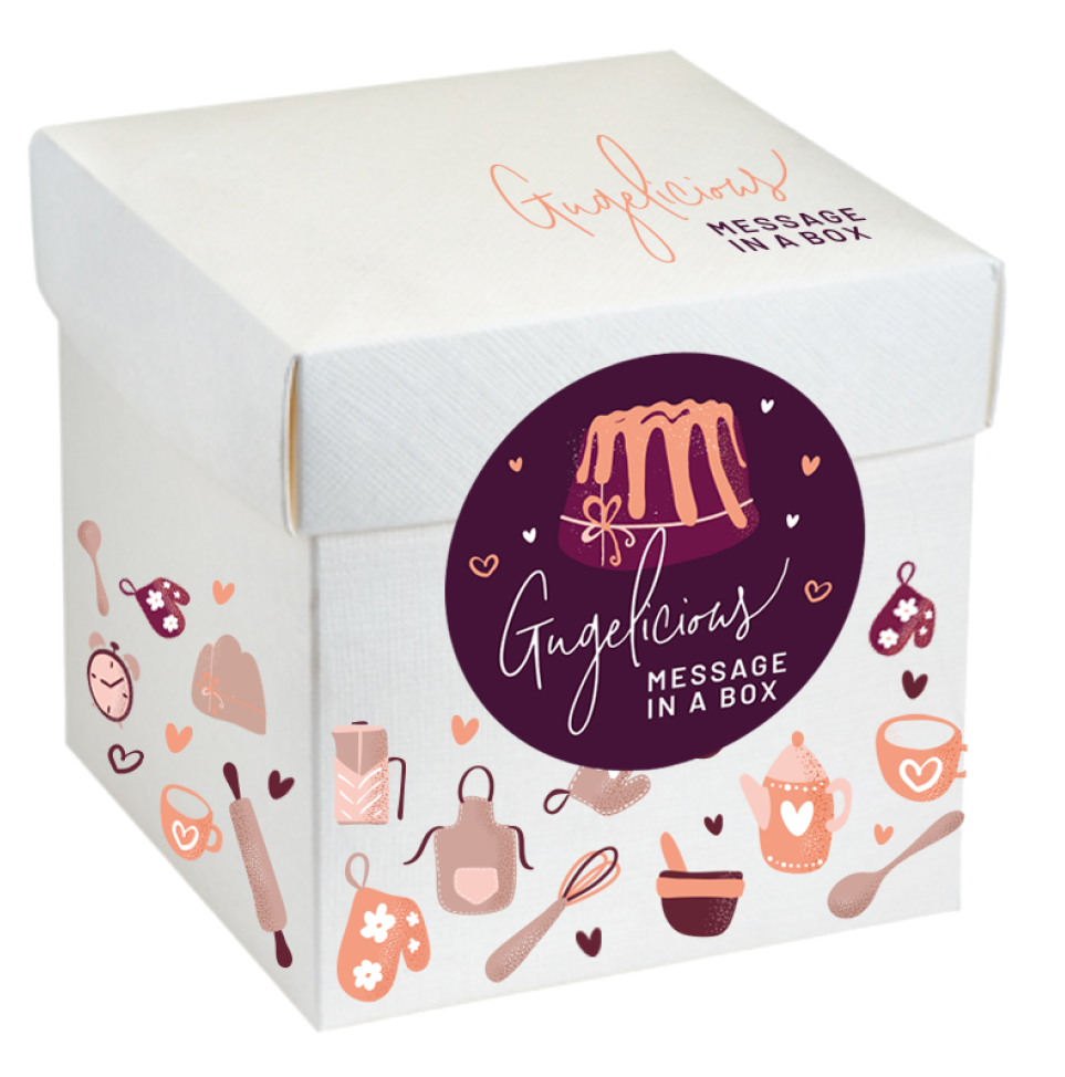 Weisse Gugelicious Geschenkbox mit Backmotiven und rundem Logo-Sticker